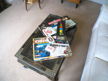 Elvis monopoly, cluedo, chess and cards in the guest lounge