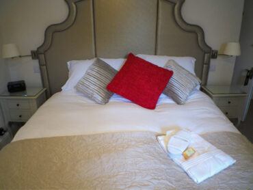 handmade luxury beds with blackout curtains, air conditioning and serene welcoming environment