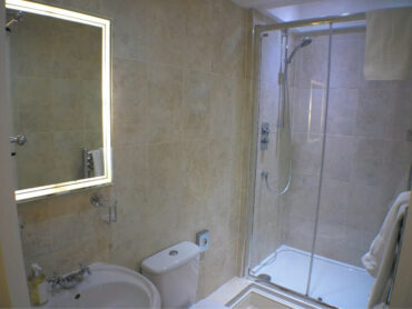luxury bathroom with power shower underfloor heating